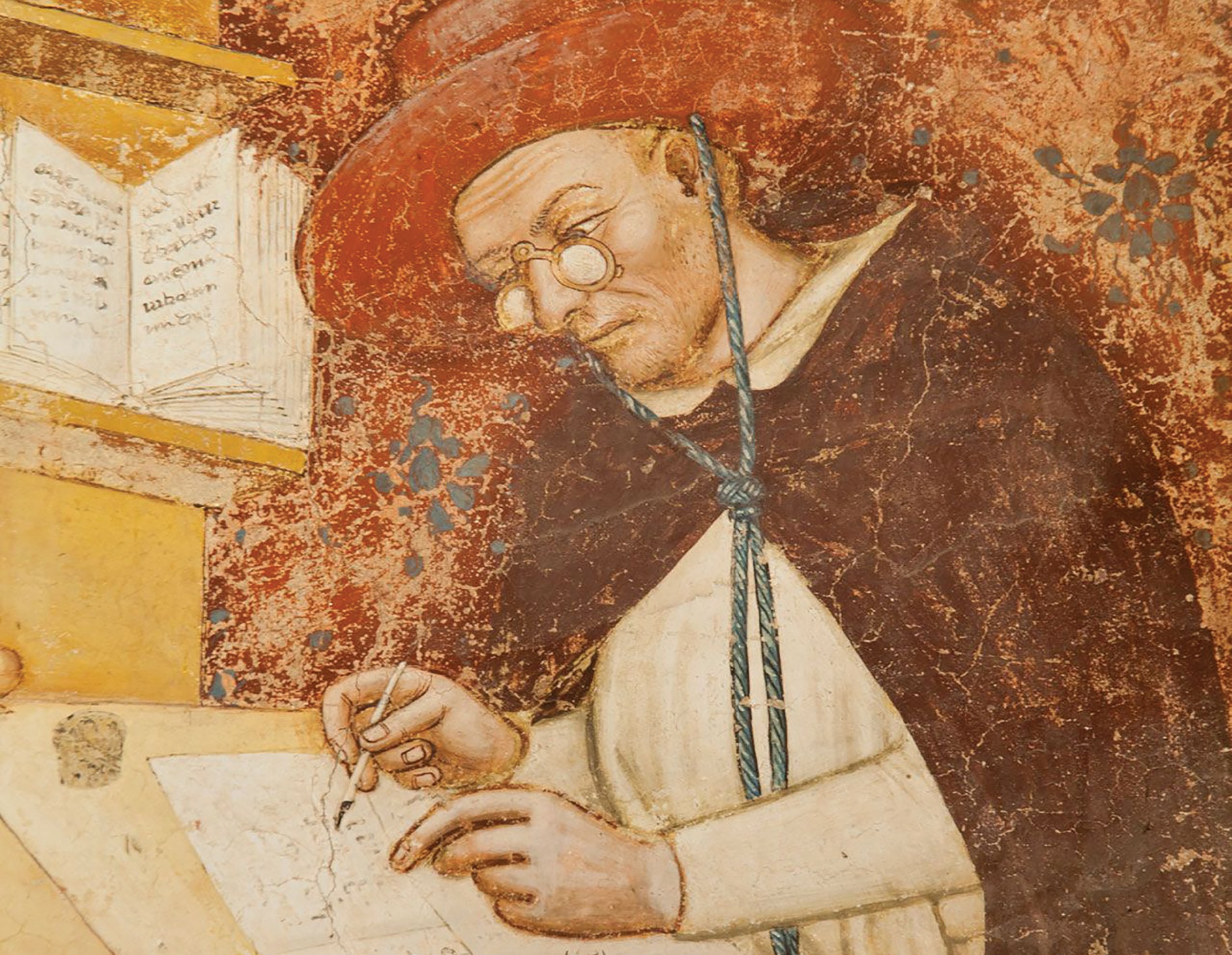 Old painting of a man reading with glasses
